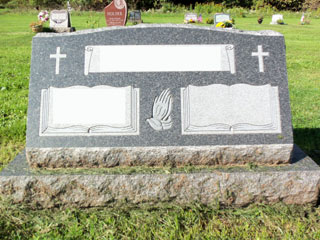 Double gray granite memorial with double crosses and praying hands