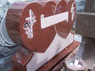 Mountain Rose granite monument with two hearts and crosses