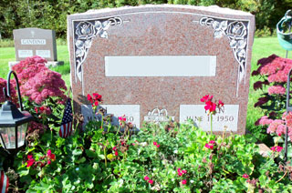 Granite Rose monument with flowers and space for two names
