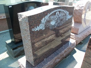 Granite monument with laser etched scene of Jesus at Karl Lutz Monument Company